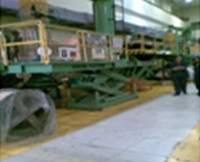 Synchronised Scissors for Vertical Winding m/c